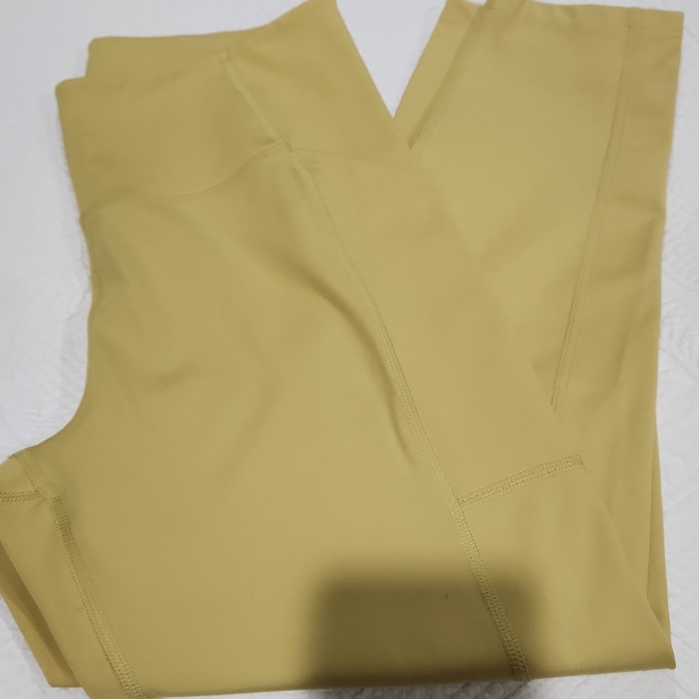 girlfriend collective High-Rise Leggings in Mustard Yellow